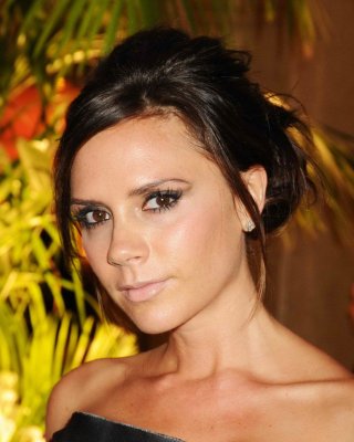 Victoria Beckham in mini dress  fuck-me boots at Diane von Furstenberg and Clari #75343802