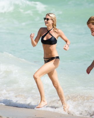 Lena Gercke showing nipple pokies in tiny black bikini #75150694