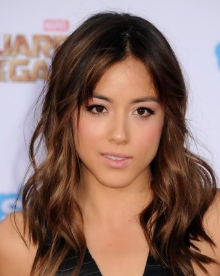 Chloe Bennet Busty In Black Leather Belly Top And Skirt At The Guardians Of The 