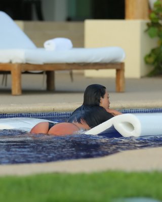 Kim Kardashian Shows Off Her Huge Boobs In A Wet Seethru Top Poolside In Mexico