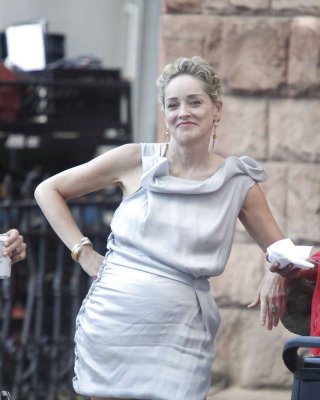 Sharon Stone Showing Her Panties Upskirt While Spread Cream On Her Legs