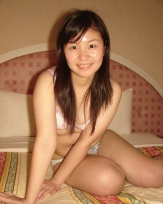 Cute And Chubby Chinese Girl Posing For The Camera