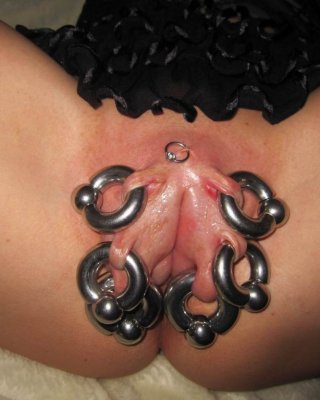 Extreme Tätowierung und Piercing
 #71962916