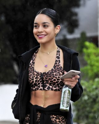 Vanessa Hudgens Looks Hot In Leopard Print Belly Top And Tights At A Rainy Day O