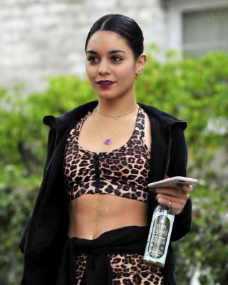 Vanessa Hudgens Looks Hot In Leopard Print Belly Top And Tights At A Rainy Day O