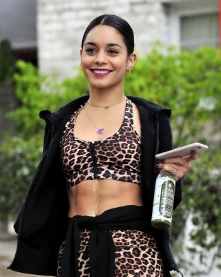 Vanessa Hudgens Looks Hot In Leopard Print Belly Top And Tights At A Rainy Day O