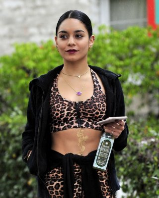 Vanessa Hudgens Looks Hot In Leopard Print Belly Top And Tights At A Rainy Day O