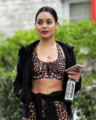 Vanessa Hudgens Looks Hot In Leopard Print Belly Top And Tights At A Rainy Day O