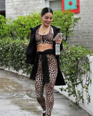 Vanessa Hudgens Looks Hot In Leopard Print Belly Top And Tights At A Rainy Day O