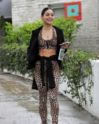 Vanessa Hudgens Looks Hot In Leopard Print Belly Top And Tights At A Rainy Day O