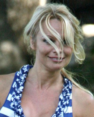 Pamela Anderson Upskirt While Snowbording On Grass And Squzzing Boobs