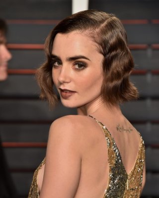 Lily Collins showing sideboob huge cleavage and legs #75145299