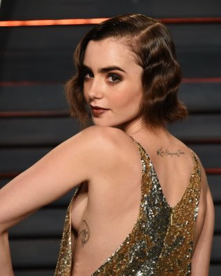Lily Collins showing sideboob huge cleavage and legs #75145306