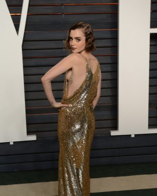 Lily Collins showing sideboob huge cleavage and legs #75145332