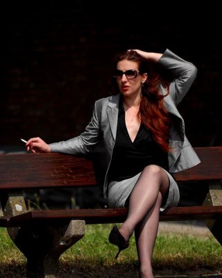 Redhead Lady Justine In Nylons Smoking Outdoors