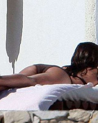 Eva Longoria Posing And Showing Her Sexy Ass And Nice Body