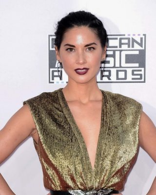 Olivia Munn Upskirt Flashing Panties In A Low Cut And High Slit Golden Dress At 