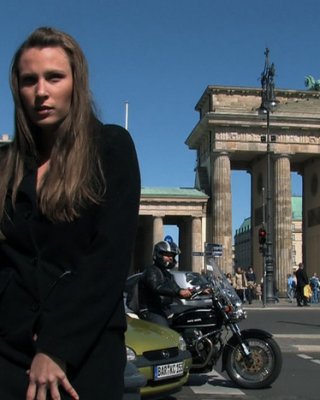 Vampish Harmony Rose is certain and naked in front of a person of Europe’s most popular monument