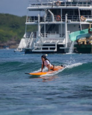 Vanessa Hudgens Wearing Black Bikini While Surfing At The Oakley Learn To Surf E