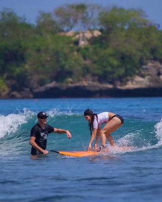 Vanessa Hudgens Wearing Black Bikini While Surfing At The Oakley Learn To Surf E