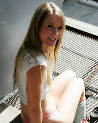 Cute Teen Flashing Out On Her Apartment Fire Escape