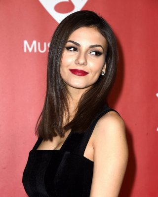 Victoria Justice Wearing Belly Top And Tight Skirt At The 2015 MusiCares Person 