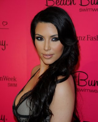 Busty Kim Kardashian Showing Huge Cleavage At The Beach Bunny Swimwear Fashion S