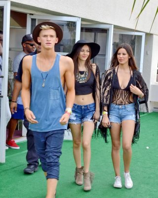 Victoria Justice Wearing Denim Shorts And Belly Top At The Hard Rock Hotel Pool 