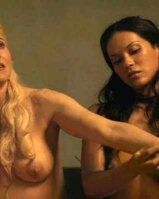 Lucy Lawless showing her nice big tits and posing sexy in latex suit #75357516