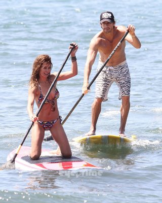 Brooke Burke Paddle Surfing In Bikini On The Malibu Beach