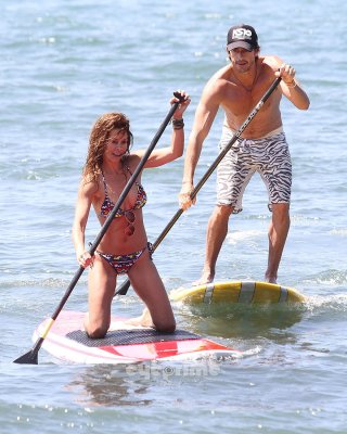 Brooke Burke Paddle Surfing In Bikini On The Malibu Beach