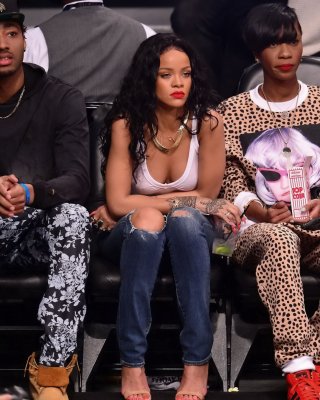 Rihanna Shows Off Her Boobs In Seethru Top At A Basketball Game In NYC