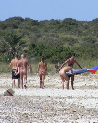 Tempting Teen nudists expose on their own at a public beach