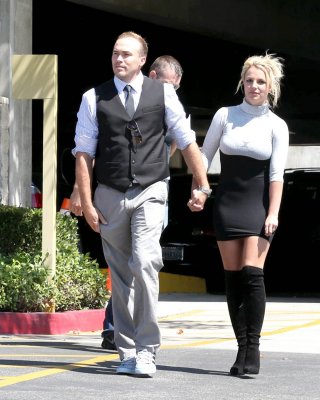 Britney Spears in tight little dress  fuck-me boots leaving a church in Thousand #75223147