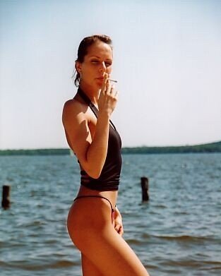 Teen Smoking At The Beach