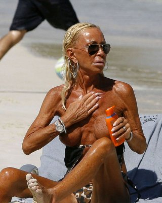 Donatella versace cought exposing her big tits on beach paparazzi pictures
 #75362520