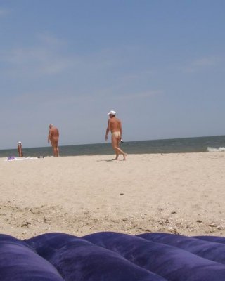 Studly These two teenager nudists participate in frisbee in the h2o