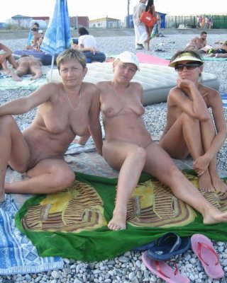 Alluring Check out out this nudist showing off her shaved pussy