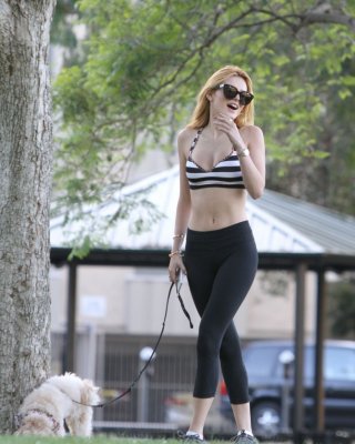 Bella Thorne Busty In A Striped Sports Bra And Tights