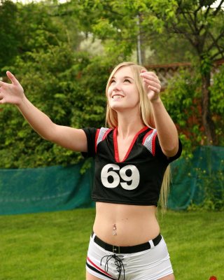 Cute Blonde Teen Girl Outdoors With Football