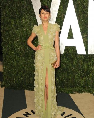 Olga Kurylenko Looks Sexy Wearing High Slit Dress At Vanity Fair Oscar Party