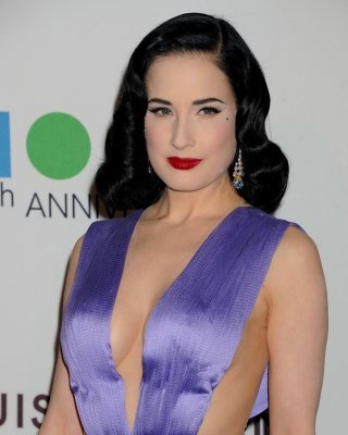 Dita Von Teese Braless Showing Cleavage And Sideboob