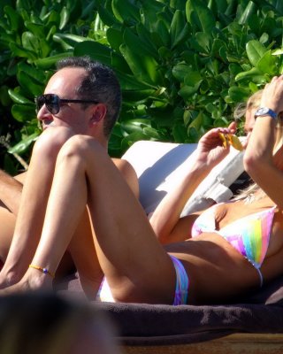 Tara Reid Wearing A Rainbow Print Bikini Poolside In Hawaii