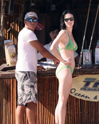 Katy Perry Showing Her Nice And Sexy Ass In Green Bikini On Beach