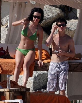 Katy Perry Showing Her Nice And Sexy Ass In Green Bikini On Beach