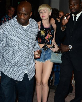 Miley Cyrus In Denim Shorts And Belly Top At Cameo Nightclub In Miami