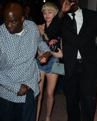 Miley Cyrus In Denim Shorts And Belly Top At Cameo Nightclub In Miami