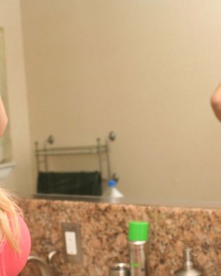 Lizzie shows off her perfect tits in the mirror as she strips out of her bra and panties #59030239