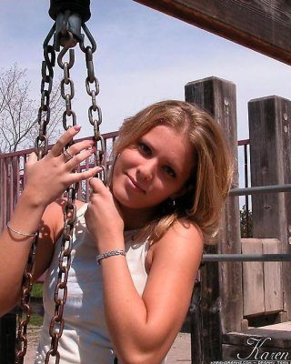 Pictures of teen babe Karen Dreams teasing at a park #57997282