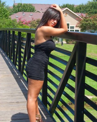 Pictures of a hot girl showing her sexy legs outside #60294380